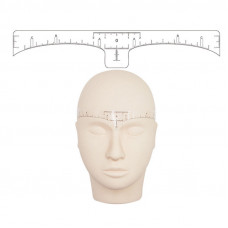 Glue ruler to mark the symmetrical shape of the eyebrows